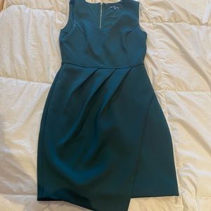 Green form fitting dress